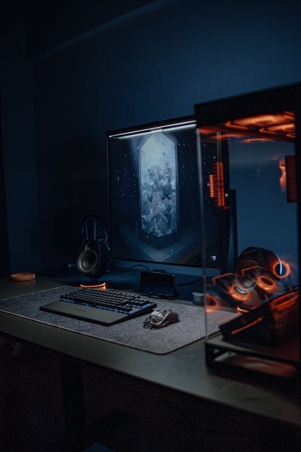 Dark gaming room setup with RGB lighting