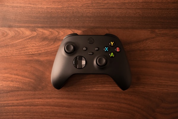 Xbox Series X controller on wooden surface
